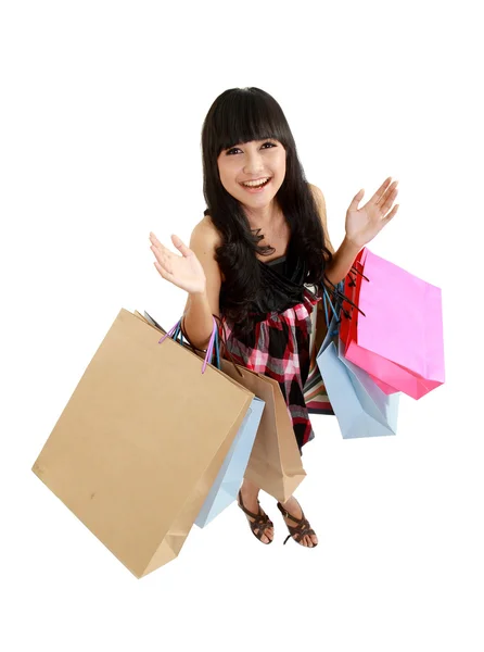Una vista superior de la mujer encantadora con bolsas de compras —  Fotos de Stock