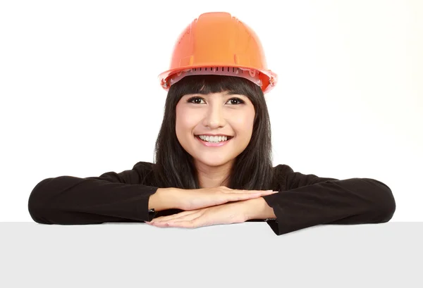 Female engineer with a banner — Stock Photo, Image
