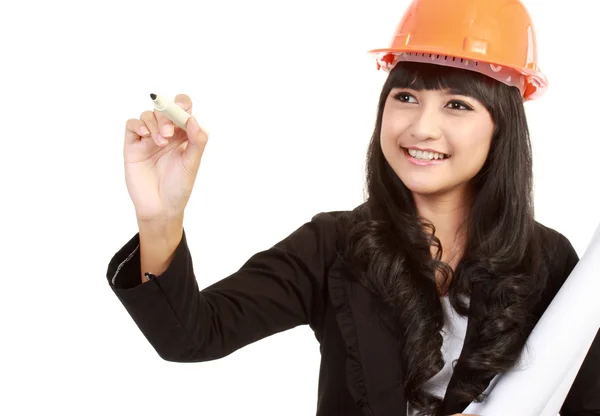 Female engineer with a pen writing — Stock Photo, Image
