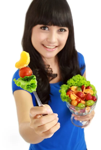 Eating fruit salad — Stock Photo, Image
