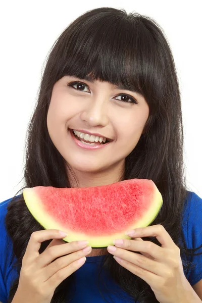 Vrouw klaar om te nemen van een hap uit watermeloen — Stockfoto