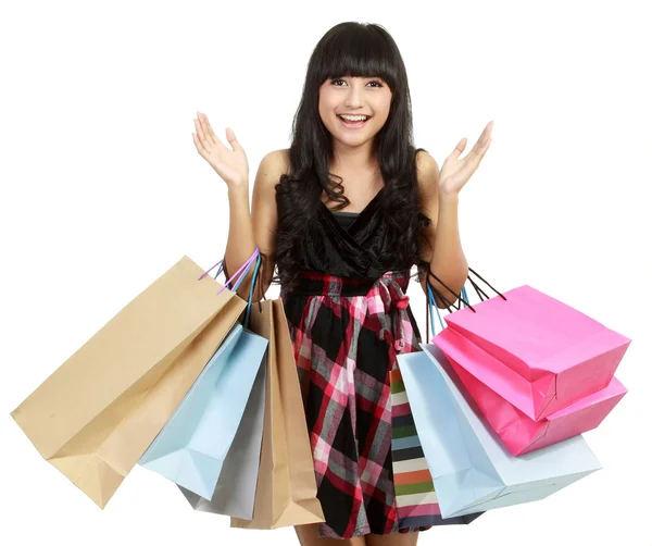 ショッピング女性幸せな笑みを浮かべて保持ショッピング バッグ — ストック写真