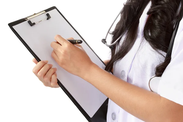 Enfermera escribiendo registros médicos — Foto de Stock