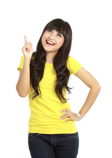 Attractive young woman pointing up — Stock Photo, Image