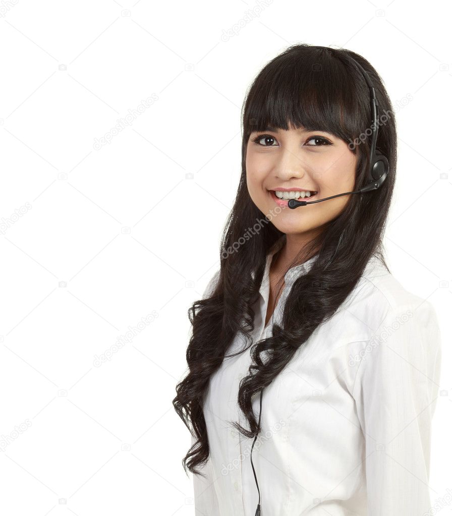 Portrait of a successful female call centre employee wearing a h