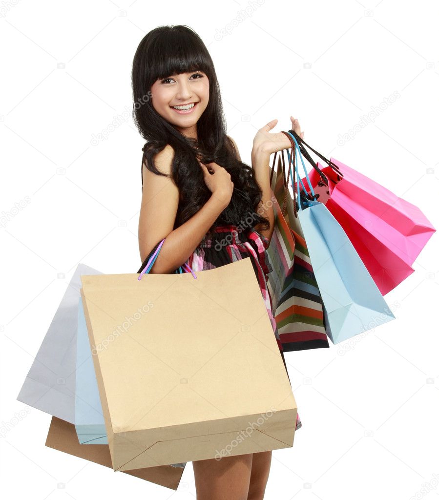 Shopping woman happy smiling holding shopping bags