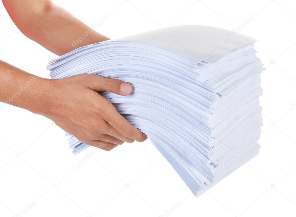 A stack of paper in his