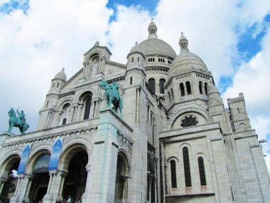 Basilica of Montmartre in a cloudy day clipart