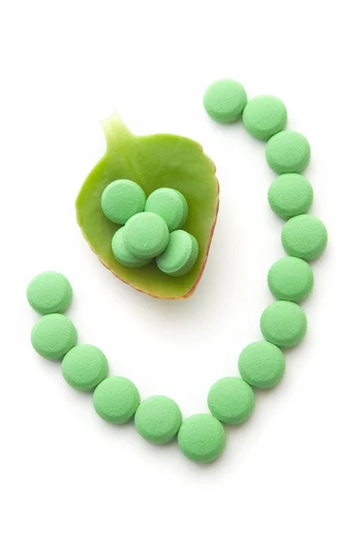 Green Pills and leaf — Stock Photo, Image