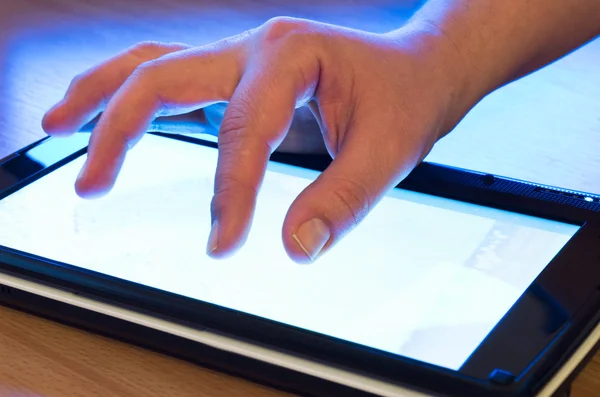 Stock image Fingers on touch screen