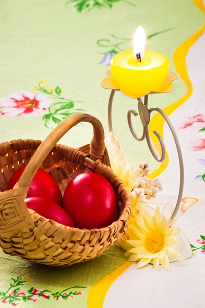 Red eggs and candle — Stock Photo, Image