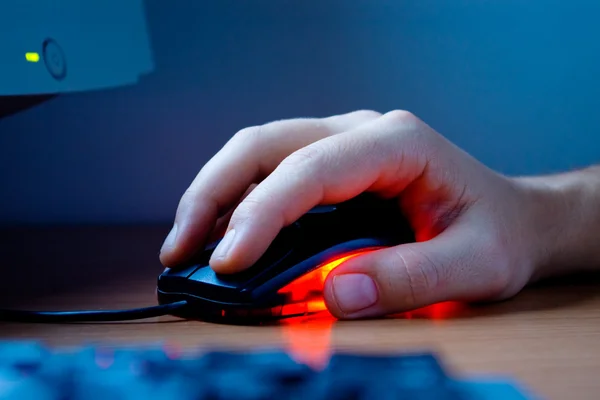 stock image Hand typing on computer mouse