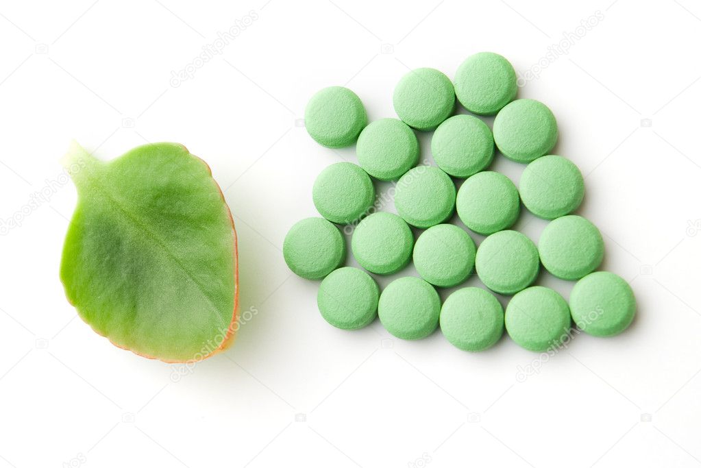 Green leaf and pills