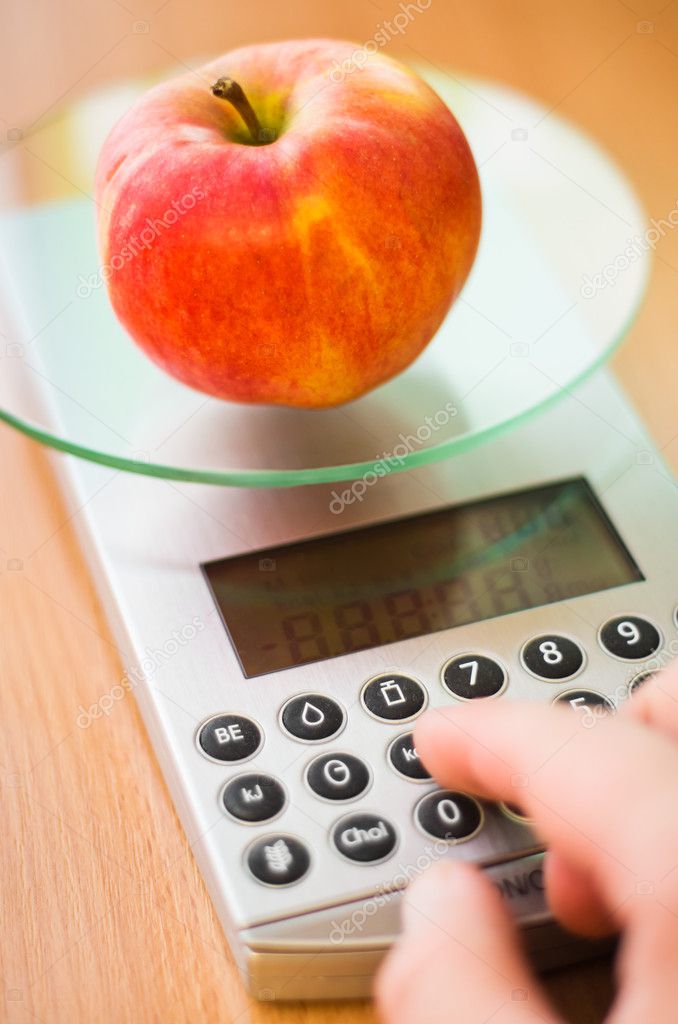 Apple on kitchen scale