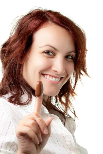 Mujer sonriente con chocolate extendido — Foto de Stock