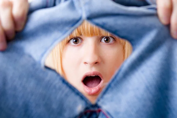 Shocked Woman with Torn Jeans — Stock Photo, Image