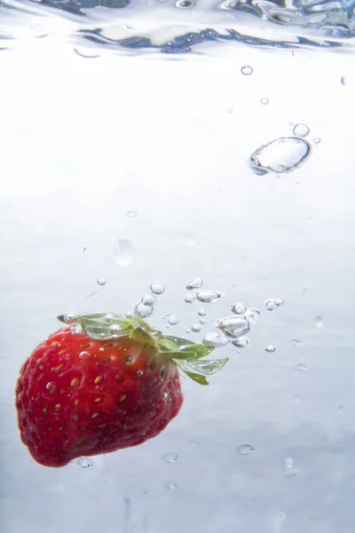 Splashing Strawberry — Stock Photo, Image