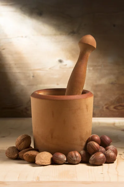 Mortar and Pestle with Almonds and Nuts — Stock Photo, Image