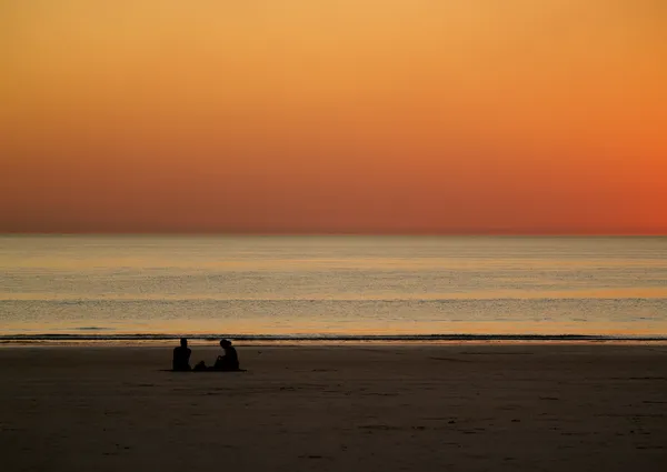 Романтичний захід сонця на пляжі Ліцензійні Стокові Фото
