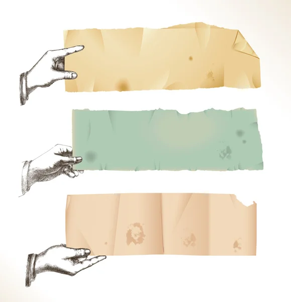 Рисование рук со старой рваной бумагой — стоковый вектор