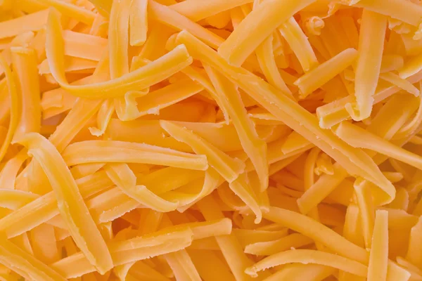 Geriebenen Cheddar-Käse — Stockfoto