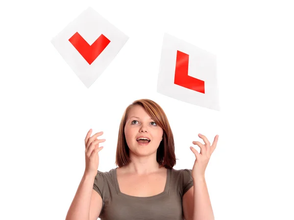 Pretty teenage girl passing her driving test — Stock Photo, Image