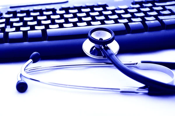 stock image Stethoscope and keyboard