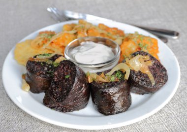 Homemade blood sausage and potato pancakes clipart