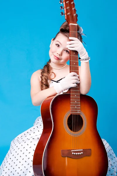 A girl with guitar — Stock Photo, Image