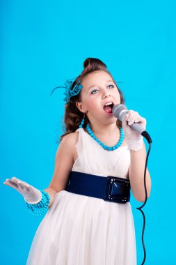 Beatifull girl with microphone clipart