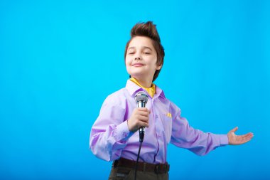 A boy with microphone clipart