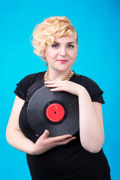 A woman with record — Stock Photo, Image