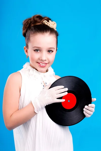 Una chica con disco de vinil — Foto de Stock