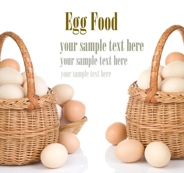 stock image Eggs and basket isolated on white