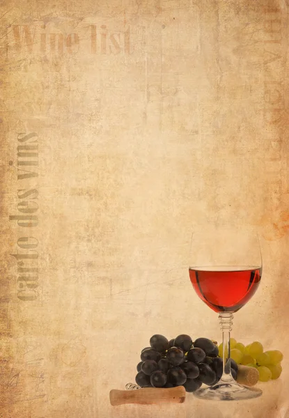 Víno v skla a ovoce na staré papírové pozadí — Stock fotografie