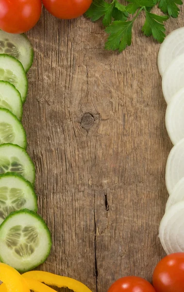 stock image Healthy vegetable food over wood background