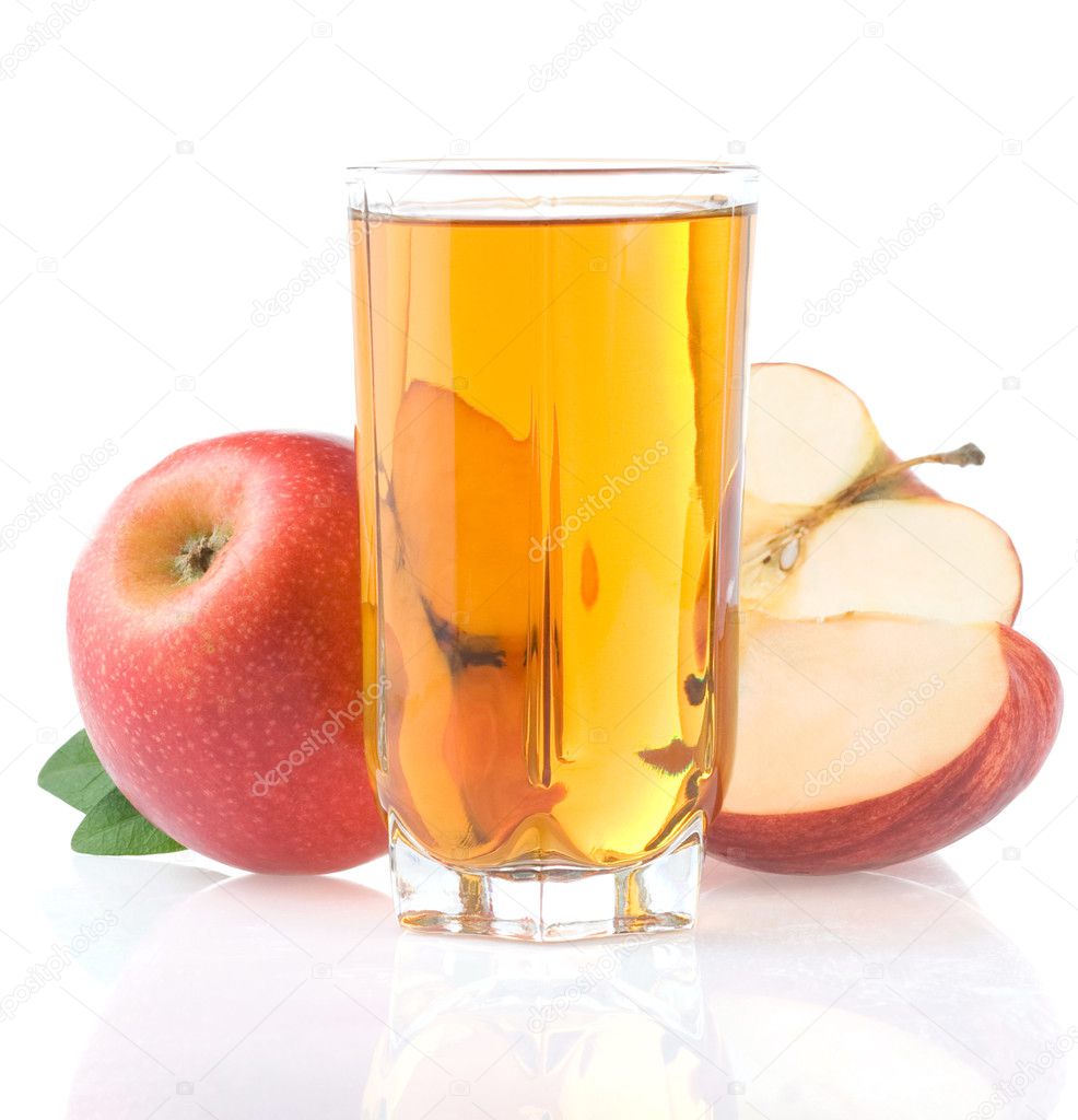 Apple juice in glass and slices isolated on white