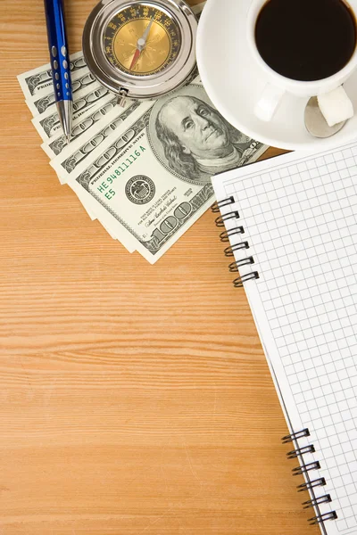 stock image Notebook and coffee with dollar