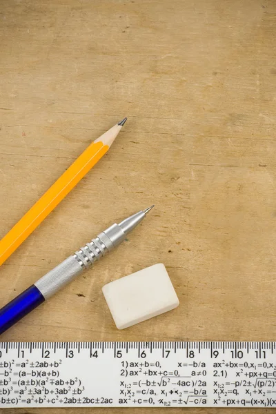 Pen, pencil and ruler on wood — Stock Photo, Image