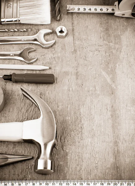 Tools and instruments on sepia — Stock Photo, Image