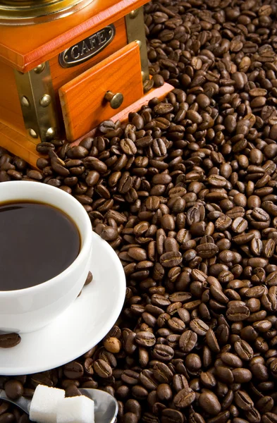 Taza de café y molinillo — Foto de Stock