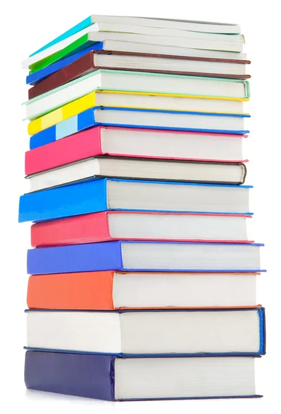 Pilha de novos livros isolados em branco — Fotografia de Stock