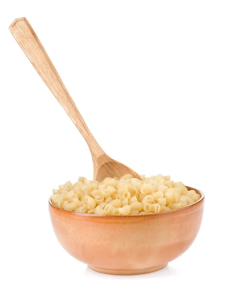 Raw pasta and wooden spoon — Stock Photo, Image