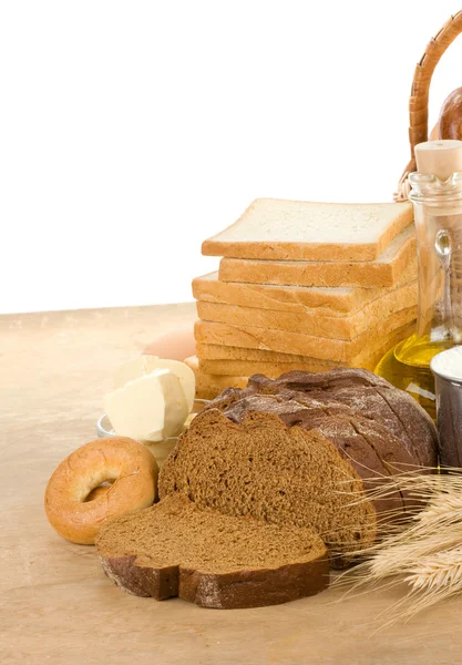 Pan y productos de panadería sobre madera —  Fotos de Stock