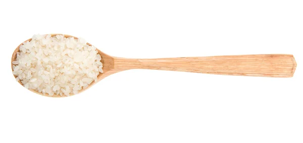 Rice grain in wooden spoon — Stock Photo, Image
