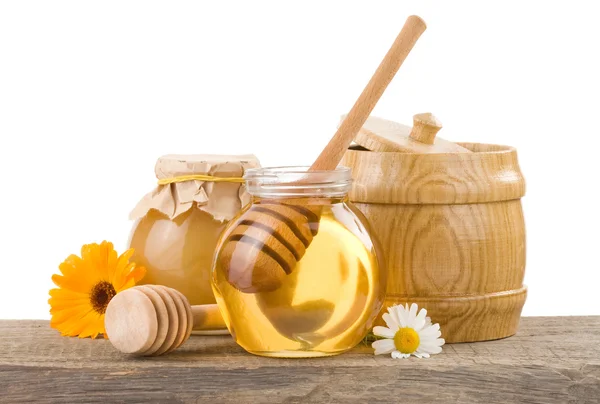 Tarro de miel y palo — Foto de Stock