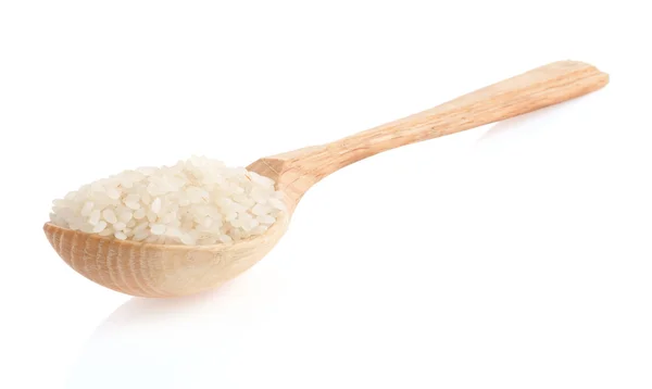 Rice grain in wooden spoon — Stock Photo, Image