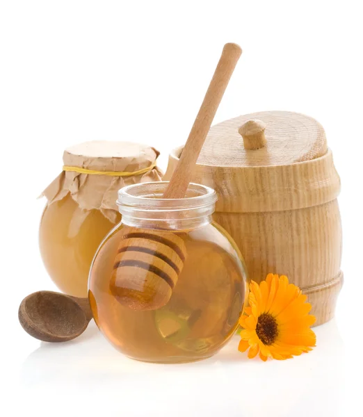 Honey and flower isolated on white — Stock Photo, Image