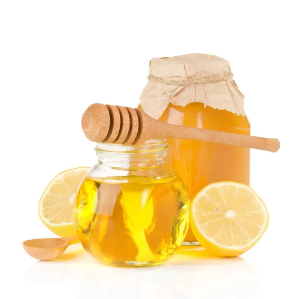 Jar full of honey and lemon — Stock Photo, Image
