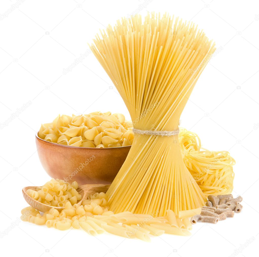 Pasta and wooden spoon on white